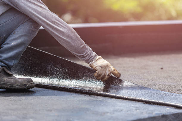 Professional Waterproofing technician working in Bon Air, VA